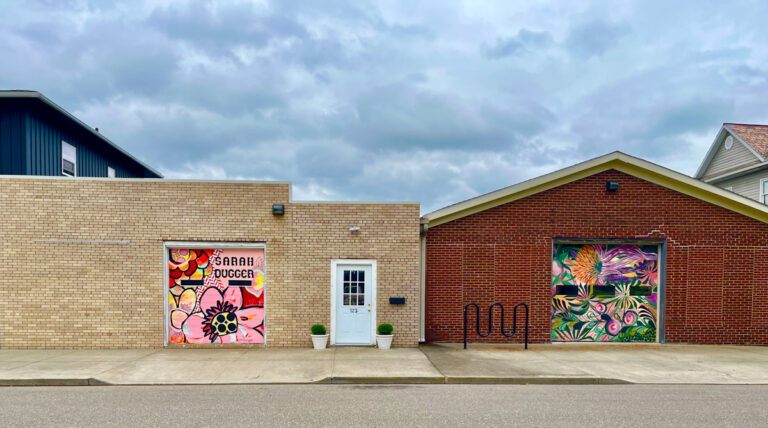 Sarah Dugger gallery outside building on cloudy day